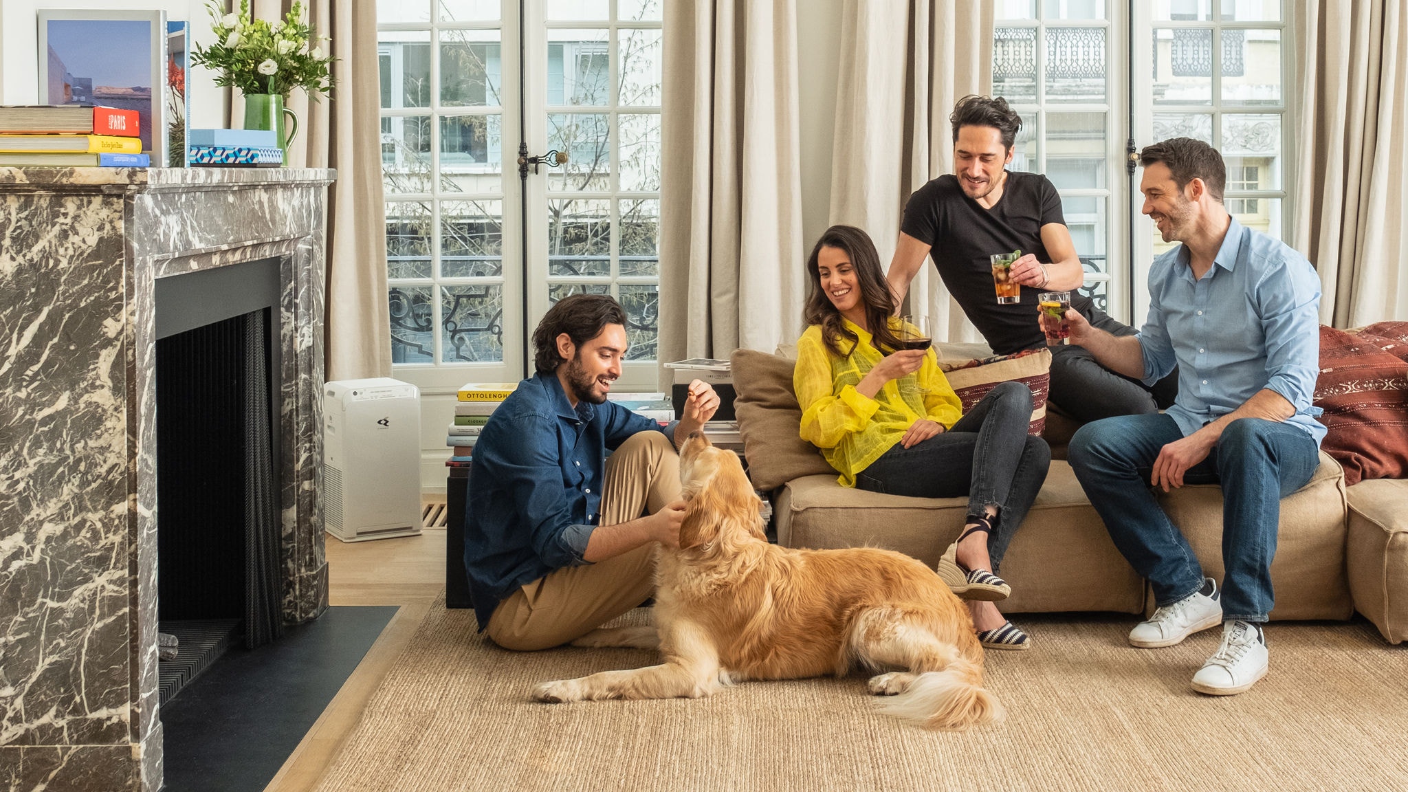 Friends and dog lounging in clean air